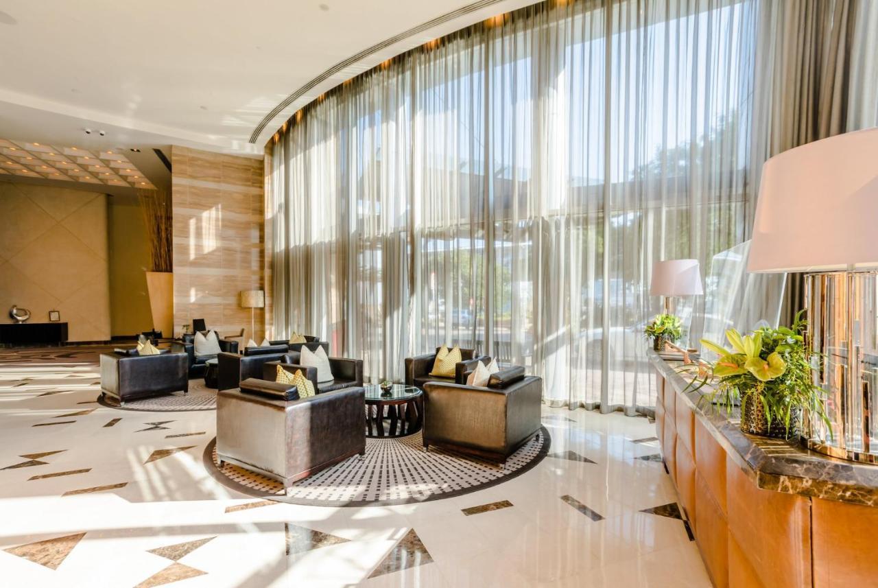 Intercontinental Johannesburg Or Tambo Airport Hotel By Ihg Kempton Park Bagian luar foto Lobby